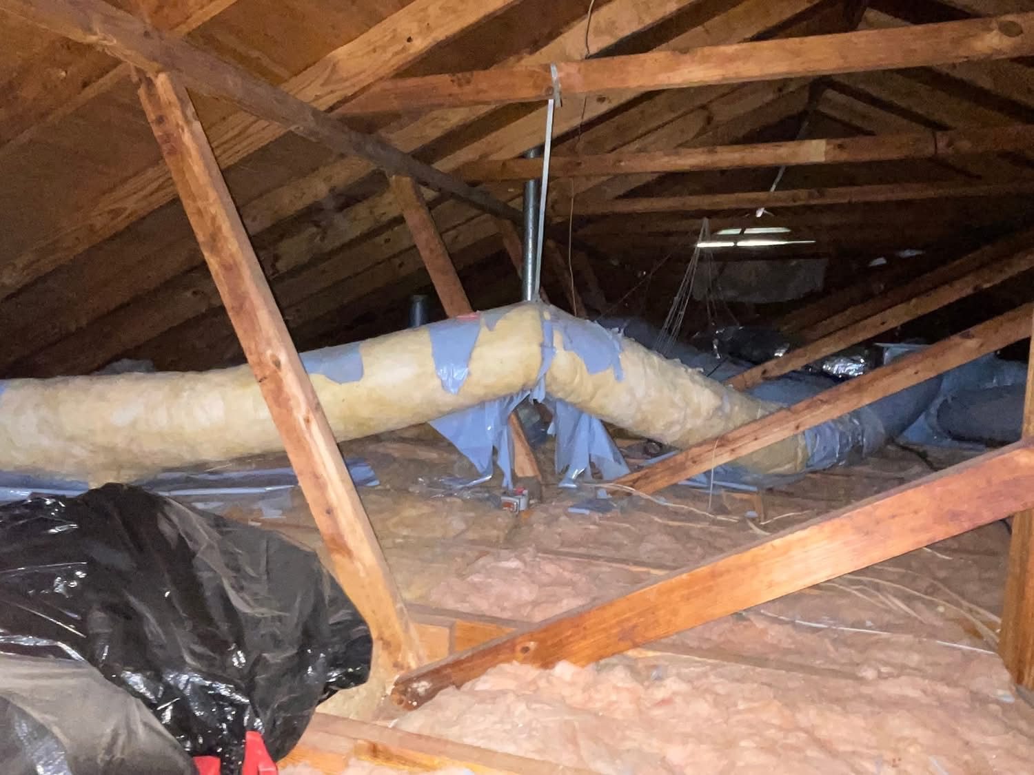 Flexible duct runs and framing inside an attic